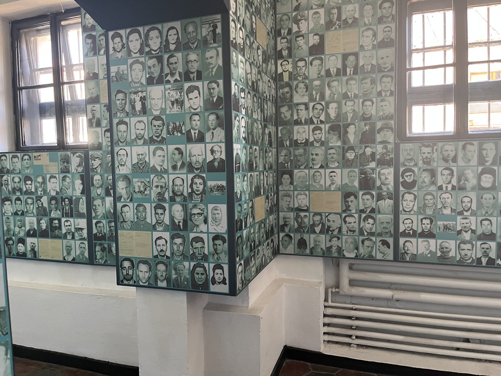 Today the walls of the Sighet Memorial carry photographs of thousands of its former prisoners